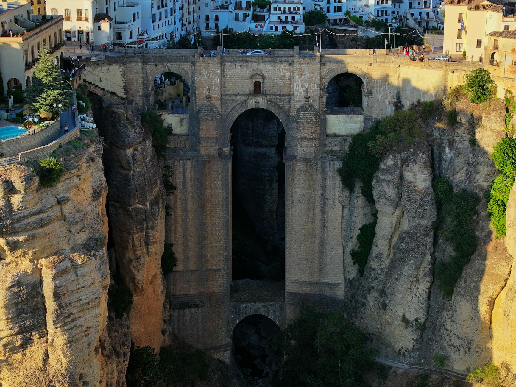 Aerial view of the iconic Puente Nuevo bridge over the El Tajo Gorge in Ronda, Spain.