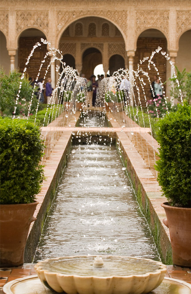 The Patio de la Acequia (Court of the Long Pond), with its 48m long pool lined with fountains, is one of the most popular parts of the Gardens Generalife in the Alhambra, Granada.